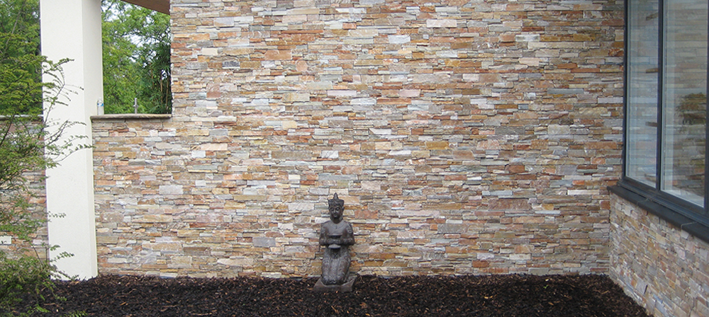 vivienda en Fife, Reino Unido, con fachada de piedra natural instalada con stonepanel 