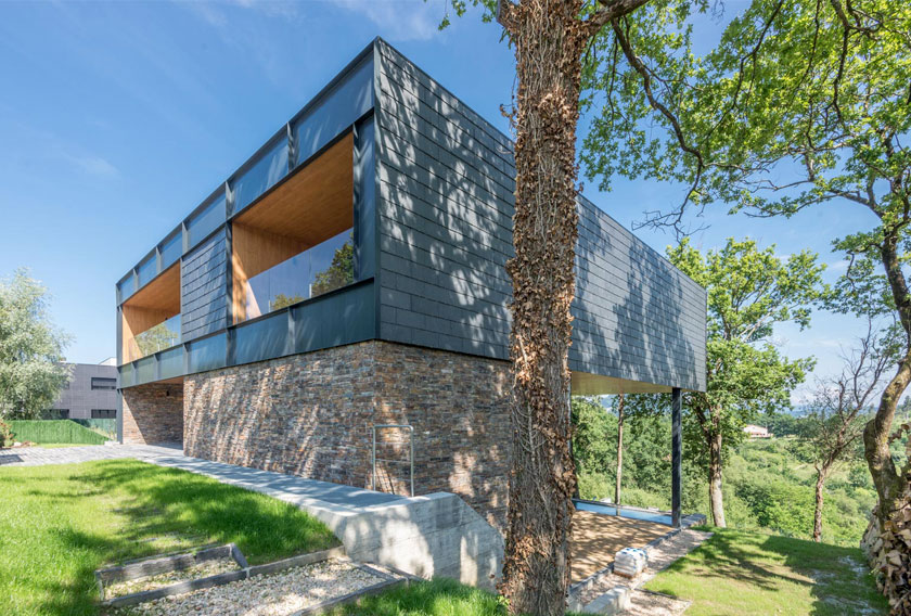 Casa flotante en Bilbao con fachada de Stonepanel y pavimento de Infercoa