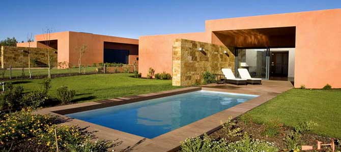 Complejo residencial L'Orangerie de Vilamoura en Portugal con Cuarcita Carioca Bronce CUPA STONE en las fachadas
