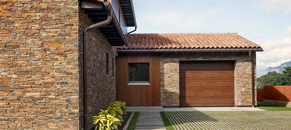 vivienda passivhaus con revestimiento en piedra natural